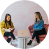 Business Energy Comparison - Two ladies chatting icon.