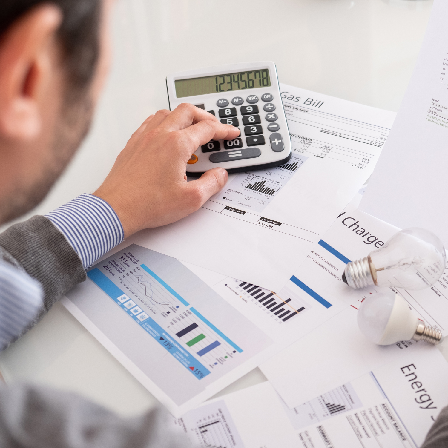 Man looking at utility bills